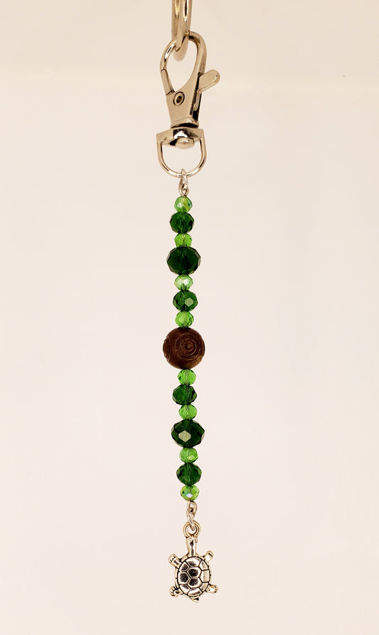 Doodad #223- Spiral Wood, Two-Toned Green Glass Gems with Silver Turtle Trinket